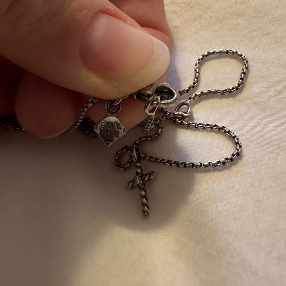 Classic Cable Cross Necklace
Sterling Silver with Center Diamond, 24.3mm, 16 in. - Picture 3 of 3